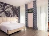 Triple room with balcony and with garden view