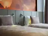 Standard Triple room with partial sea view
