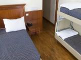 Quadruple room with side sea view