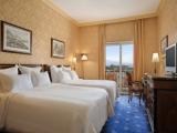 Superior Quadruple room with balcony and with partial sea view