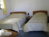 Standard Triple room with garden view