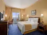 Superior room with balcony and with partial sea view