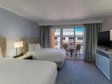 Deluxe Quadruple room with balcony and with partial ocean view