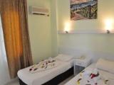 Standard Triple room with partial sea view