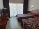 Standard Quadruple room with city view