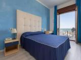 Standard Quadruple room with balcony and with sea view