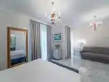 Deluxe Quadruple room with balcony