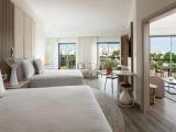 Executive Quadruple Club Suite with balcony and with pool view