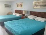 Deluxe Quadruple room with balcony