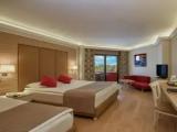 Standard Triple room with side sea view