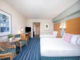 Quadruple Waikiki Tower room with mountain view