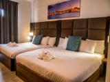 Family Quadruple room with balcony and with city view