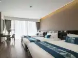 Triple Suite with balcony and with city view and partial sea view