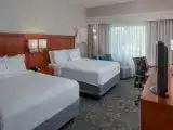Poolside Quadruple room with courtyard view