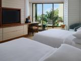 Twin room with partial ocean view