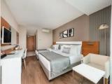 Standard Triple room with side sea view