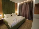 Deluxe Quadruple room with balcony