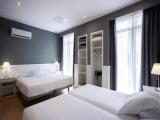 Superior Quadruple room with side street view