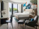Room with balcony and with pool view