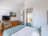 Twin room with balcony and with pool view