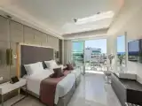 Superior Twin room with side sea view