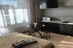 Uyutnaya studiya Apartments