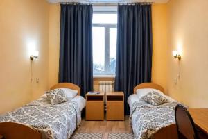 Dvuhmestnyy nomer s 2 otdelnymi krovatyami standart Apartments, Severodvinsk