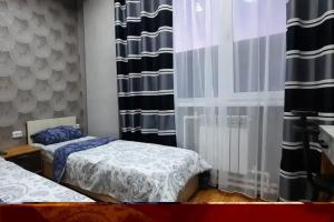 Dvuhmestnyy nomer s 2 otdelnymi krovatyami komfort Apartments, Nizhniy Tagil