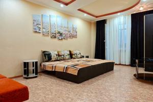 Uyutnaya ryadom s yarmarkoy Apartments