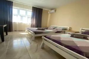 Tryohmestnyy nomer uluchshennyy Apartments, Berdyansk