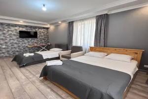 Tryohmestnyy nomer lyuks Apartments
