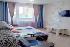 Uyutnaya ryadom tsentrom Ilizarova Apartments