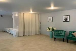 Dom s kuhney Cottage, Vyaznika