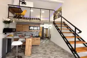 Komfortnaya studiya dlya kratkosrochnogo prozhivaniya Apartments