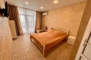 Tryohmestnyy nomer uluchshennyy Apartments, Candripsh