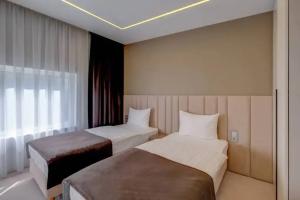 Dvuhmestnyy nomer s 1 krovatyu standart s dvumya razdelnymi ili odnoy obshchey krovatyu Apartments, Severodvinsk