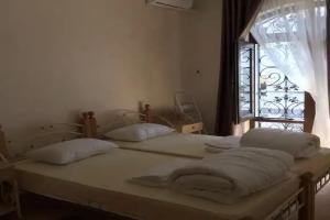 Dvuhmestnyy nomer s 2 otdelnymi krovatyami standart Apartments, Thubun