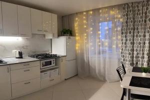 Uyutnaya v parkovoy zone goroda Apartments, Kellerovo