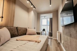 s beskontaktnym zaseleniem v lyuboe vremya, s zakrytoy parkovkoy Apartments