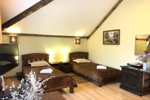 Dvuhmestnyy nomer s 2 otdelnymi krovatyami standart Apartments, Schekino