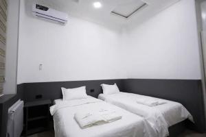 Dvuhmestnyy nomer s 2 otdelnymi krovatyami standart Apartments