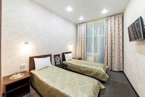 Dvuhmestnyy nomer s 2 otdelnymi krovatyami standart Apartments, St. Petersburg