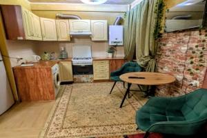 Komfortnaya uyutnaya studiya v tsentre goroda Apartments, Donetsk