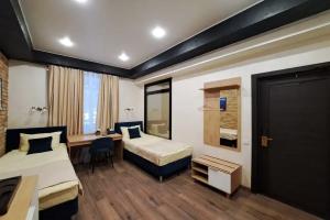Dvuhmestnyy nomer s 2 otdelnymi krovatyami standart Apartments, Pushkino
