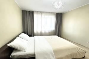 2 spalni i balkon Dom Kaspera na Prostornoy Apartments, Putilkovo