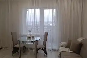Uyutnaya studiya ryadom s aeroportom Tolmachevo Apartments, Ob'