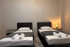 Dvuhmestnyy nomer s 2 otdelnymi krovatyami standart Apartments, Derbent