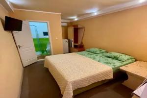 Dvuhmestnyy nomer s 2 otdelnymi krovatyami standart Apartments, Berdyansk