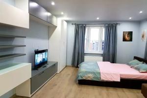 v tsentre na chasy sutki mesyatsy Apartments