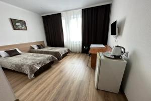 Dvuhmestnyy nomer s 2 otdelnymi krovatyami standart Apartments, Yalutorovsk